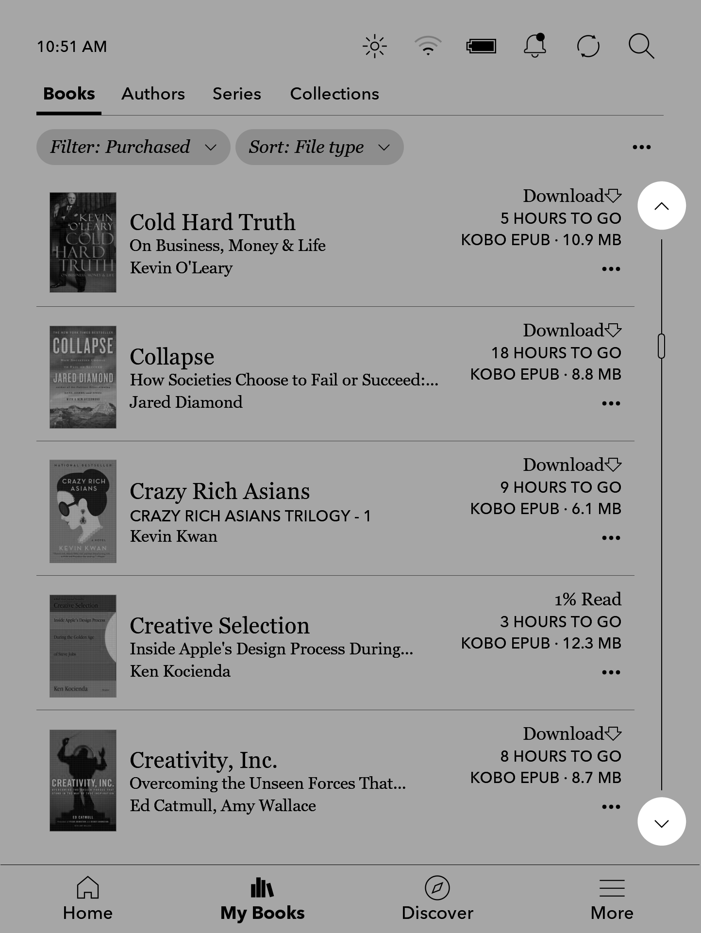 Menu Libri dell'eReader Kobo con i chevron per girare pagina evidenziati sul lato destro dello schermo.